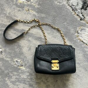 Authentic Louis Vuitton purse.